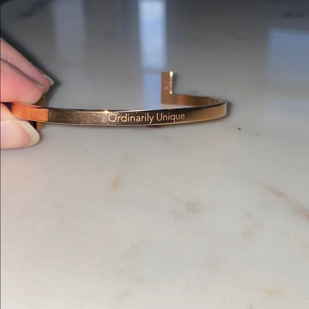 COPY - Bracelet cuff, reads “Ordinarily Unique”